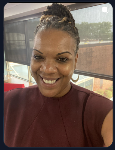 Coach Mo smiling at venue